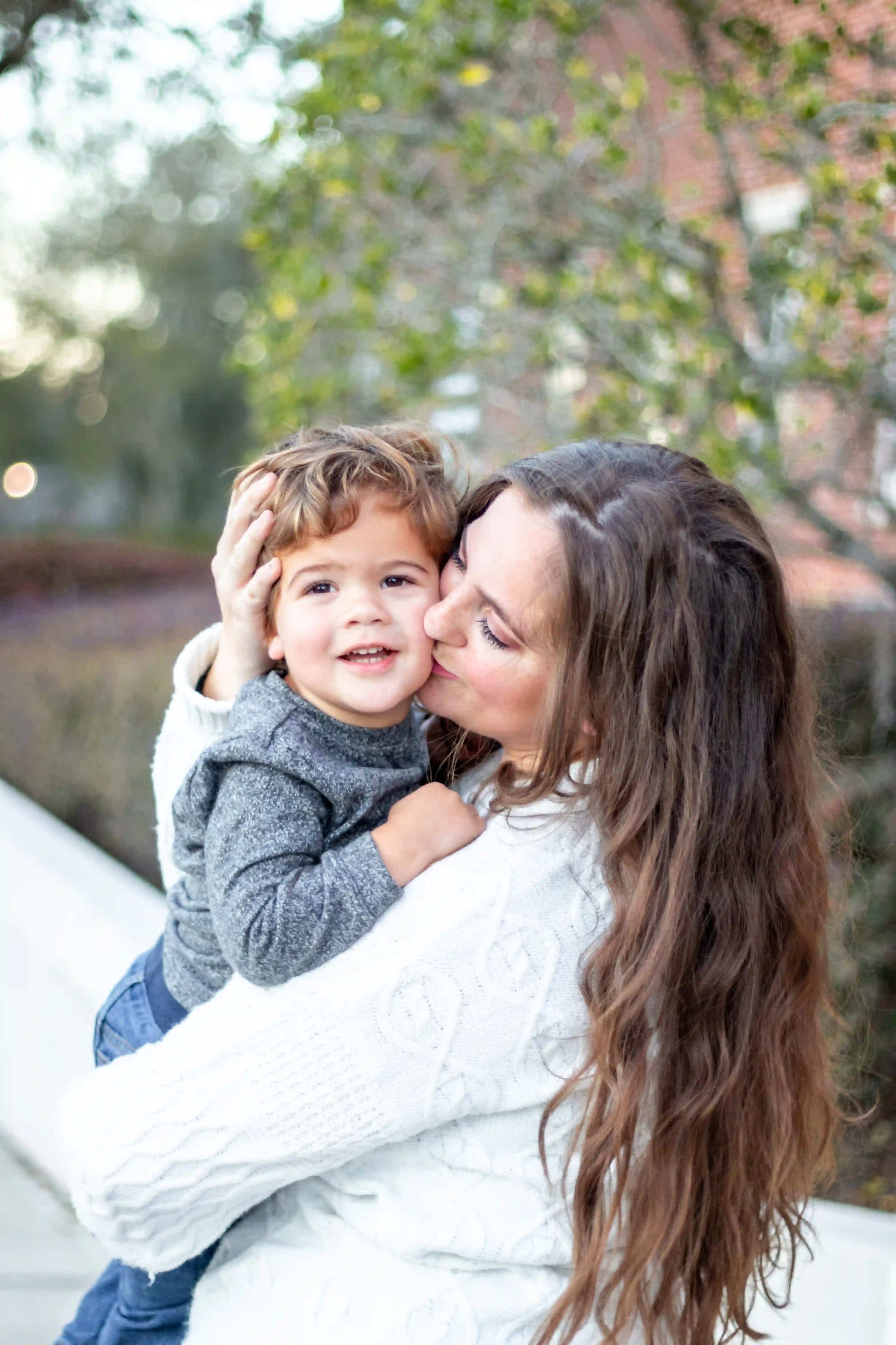 Mommy and me photo of mother holding her young son